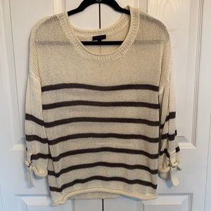 Cream and grey striped sweater with buckle detail on sleeves, L